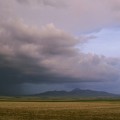 Spring Storm West Butte
~
The distant peal of thunder announced the coming rain/ 
The blackened wall of water immersed the eastern plains/
In hope and dreams of autumn and bounty from the grain.